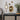 Baroque framed vintage art prints with wall decor above a black console table