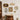 A vintage gallery wall set with six elegant frames in oval, hexagon, round, rectangular and heart shapes on a wall above a vintage dresser.